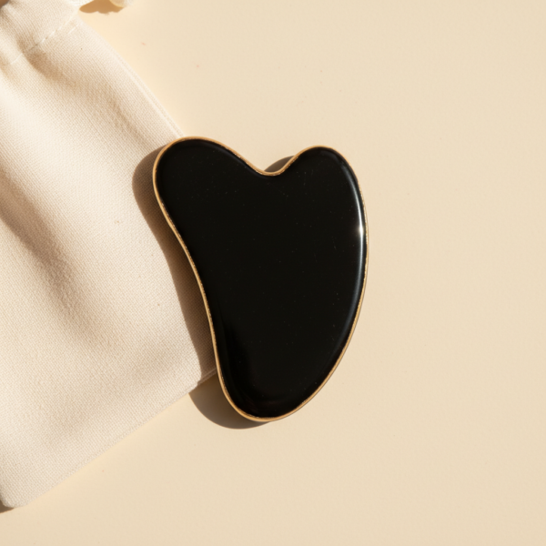 Gua sha obsidienne noire sertie
